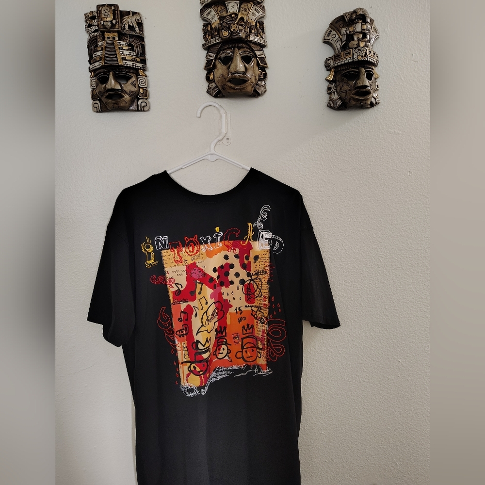 Orange and Black Short Sleeve Tee with Striking Graphic